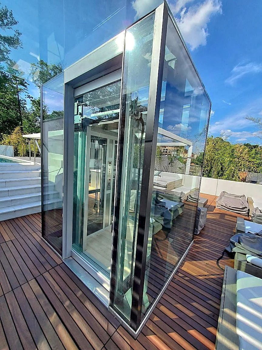 RMEP full-glass elevator cab, exterior rooftop installation